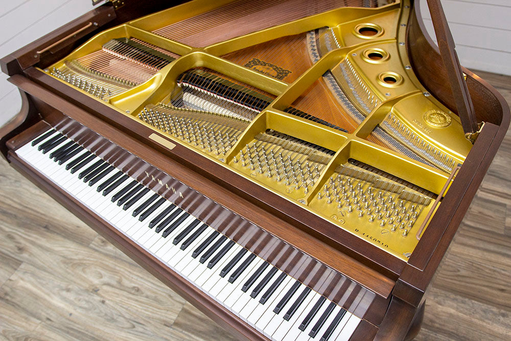 yellow grand piano